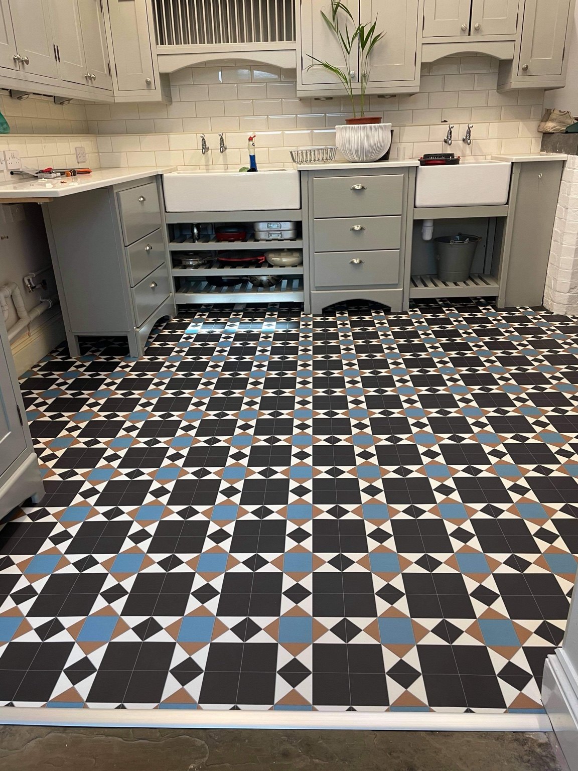 Geometric flooring in a country kitchen